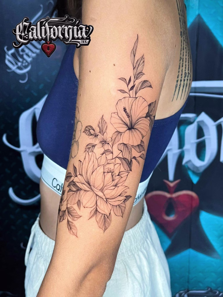 Fine line floral tattoo by California Ink Thailand