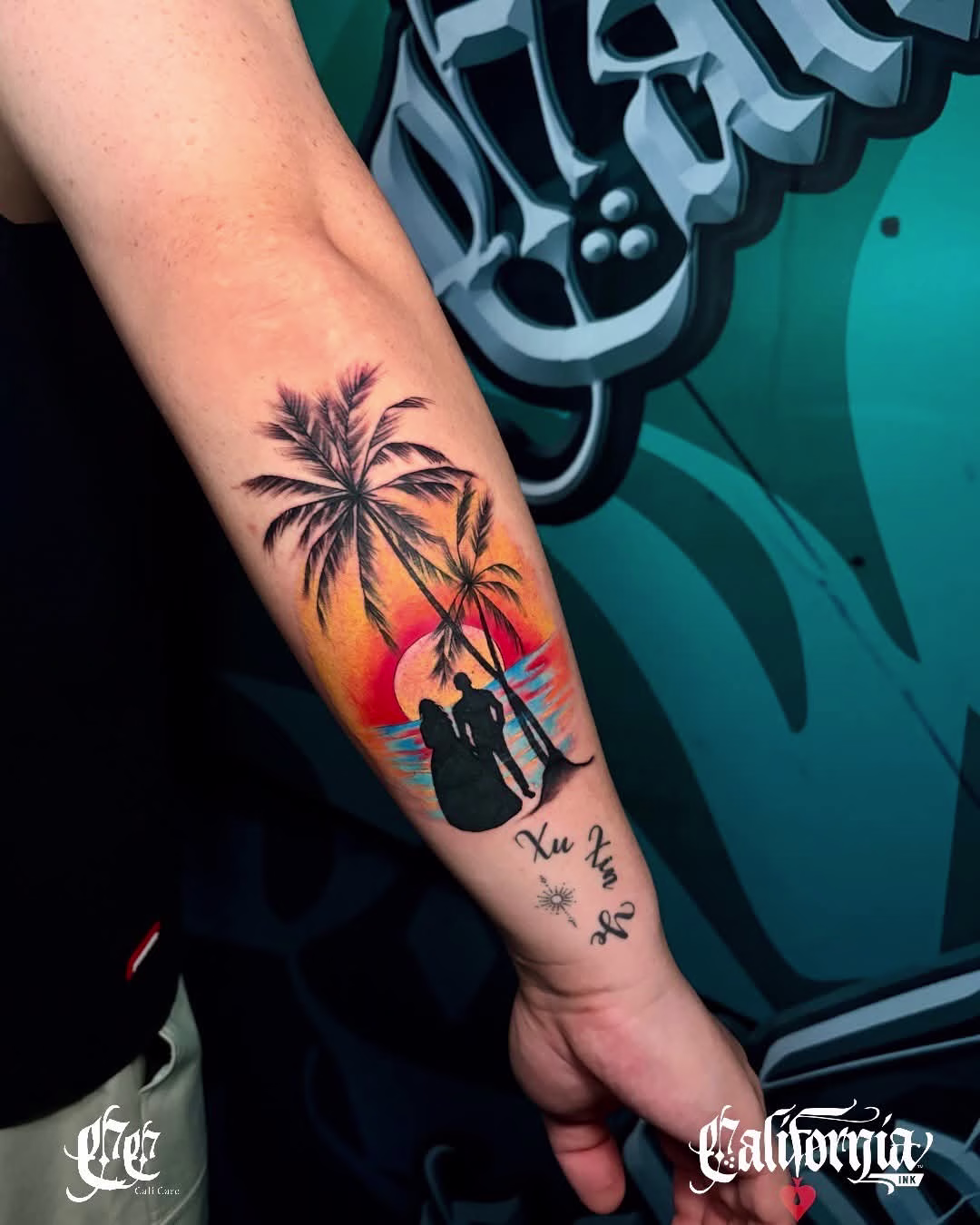 Colorful palm tree tattoo on a forearm