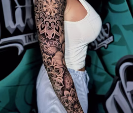 Mandala tattoo full sleeve with detailed geometric and floral patterns