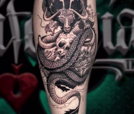 Anime tattoo of a demon character with a dragon