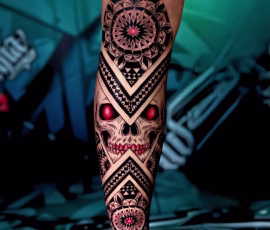 Geometric tattoo of a skull with diamond patterns