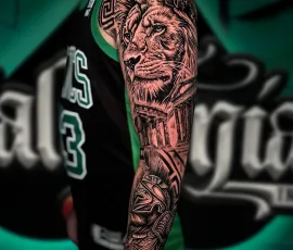 Healed black and grey lion realism sleeve tattoo