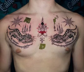 Sak Yant tattoo with twin tigers and sacred script