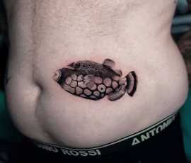 Micro realism tattoo of a fish