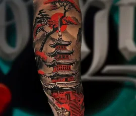 Japanese realism tattoo of a pagoda with cherry blossoms