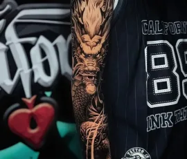 Japanese realism tattoo sleeve with a dragon in color