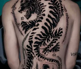 Sak Yant tattoo of a large tiger, covering the entire back