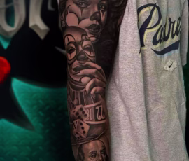 Chicano style tattoo of a sad clown face