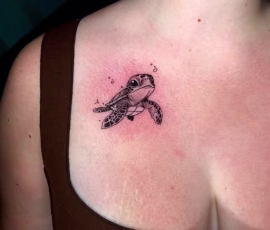 Micro realism tattoo of a small turtle
